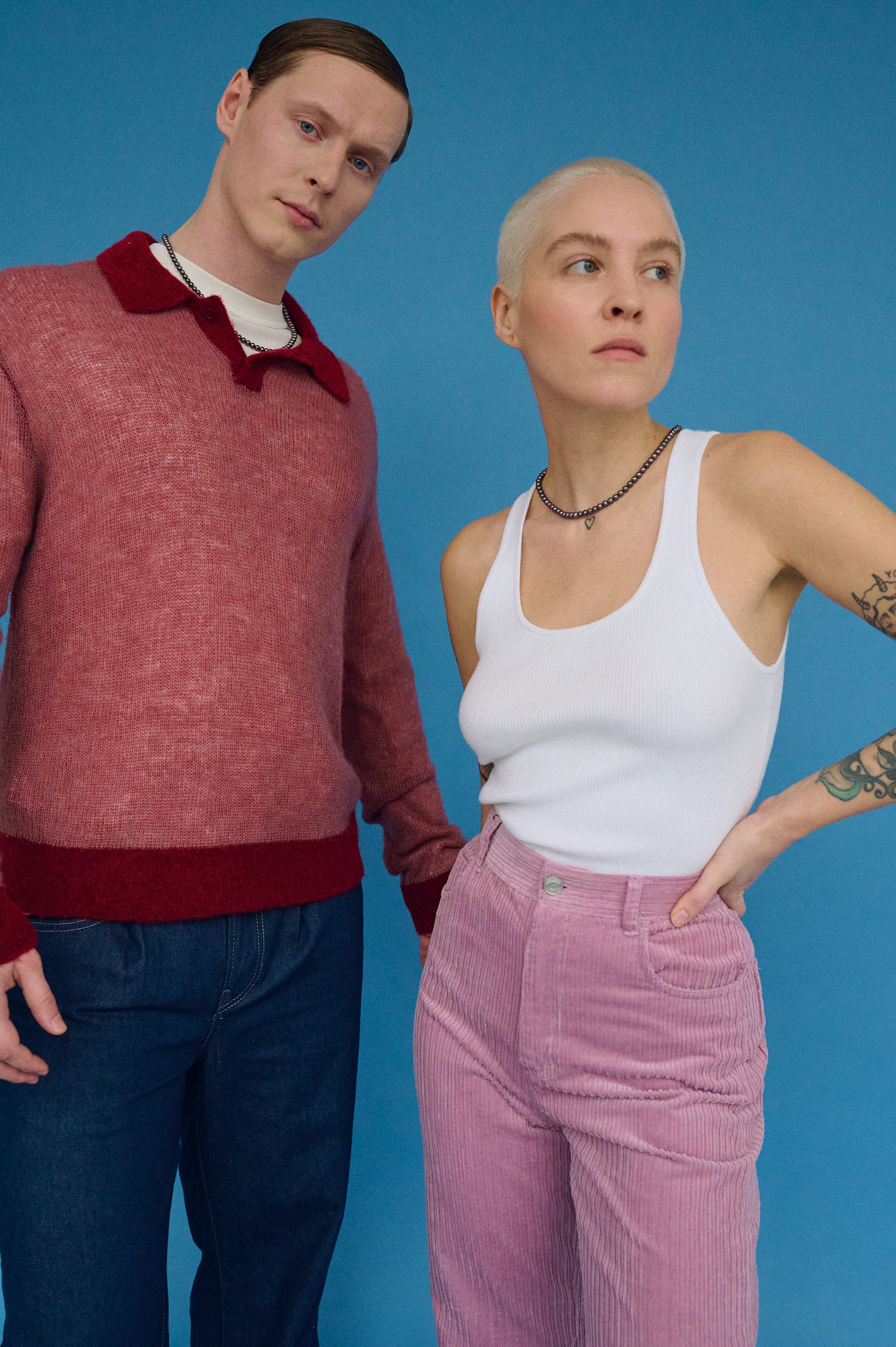 Couple wearing matching dark freshwater pearl necklaces
