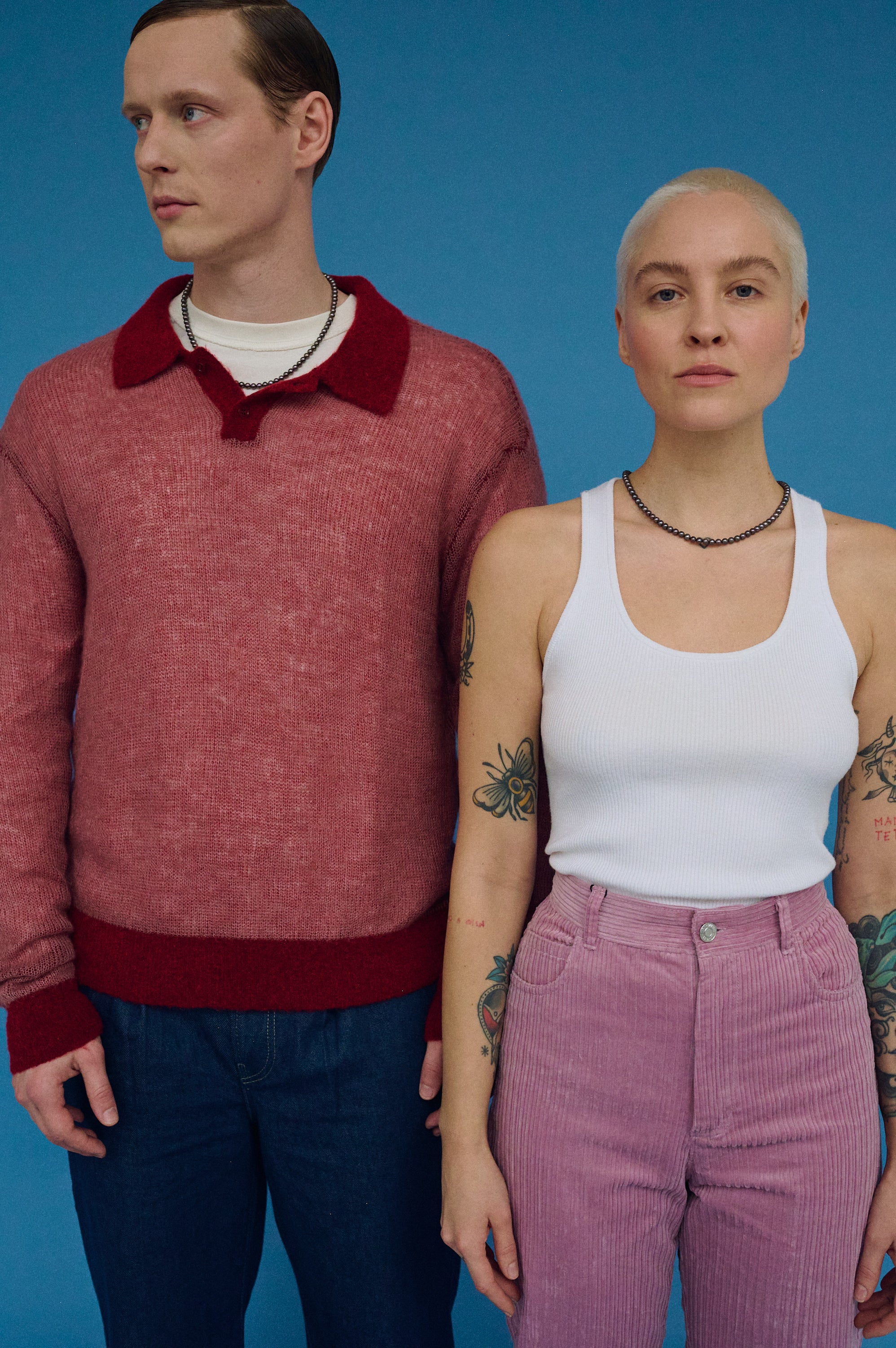 Couple wearing matching dark freshwater pearl necklaces