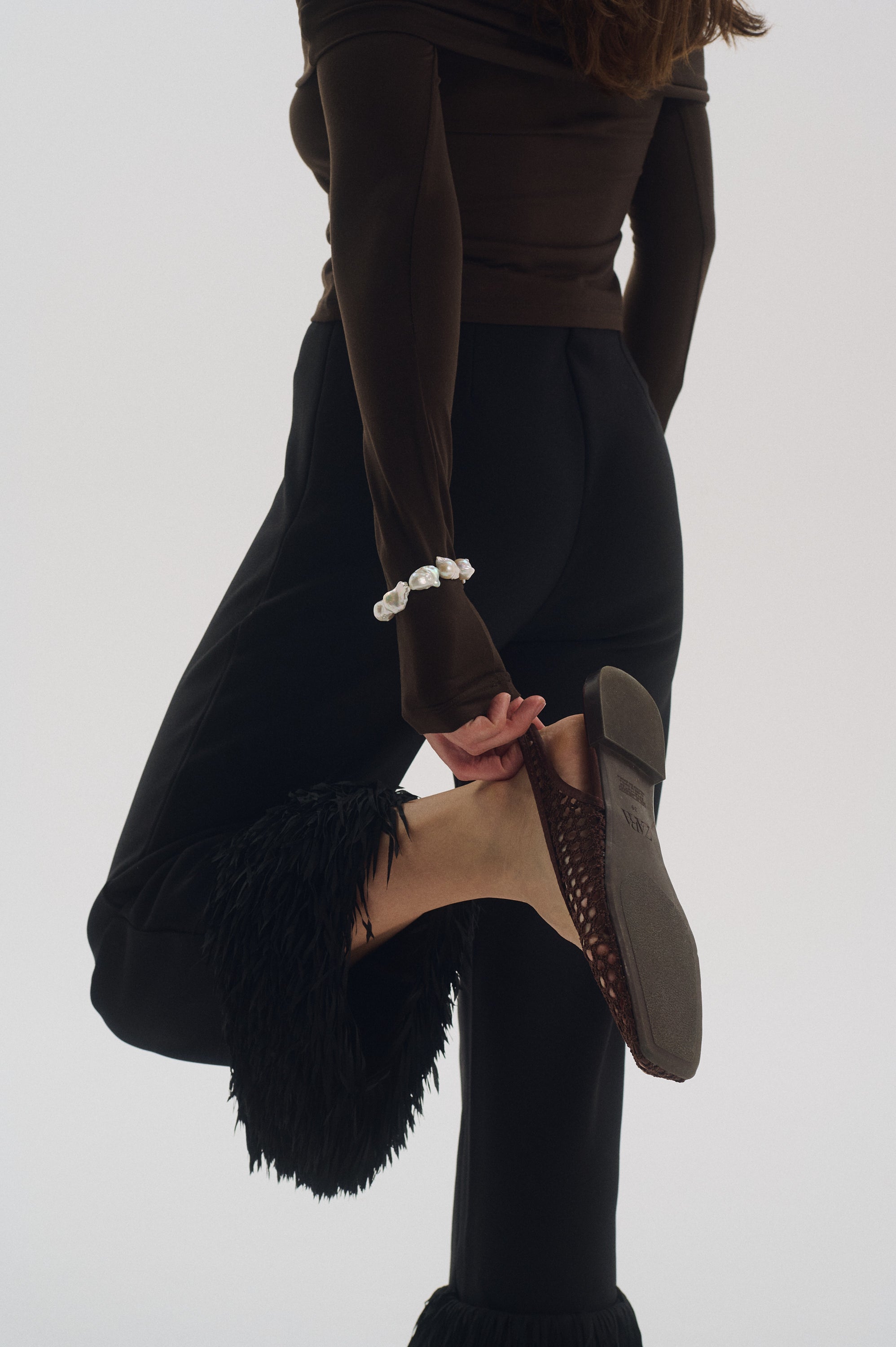 Elegant outfit styled with chunky baroque pearl bracelet