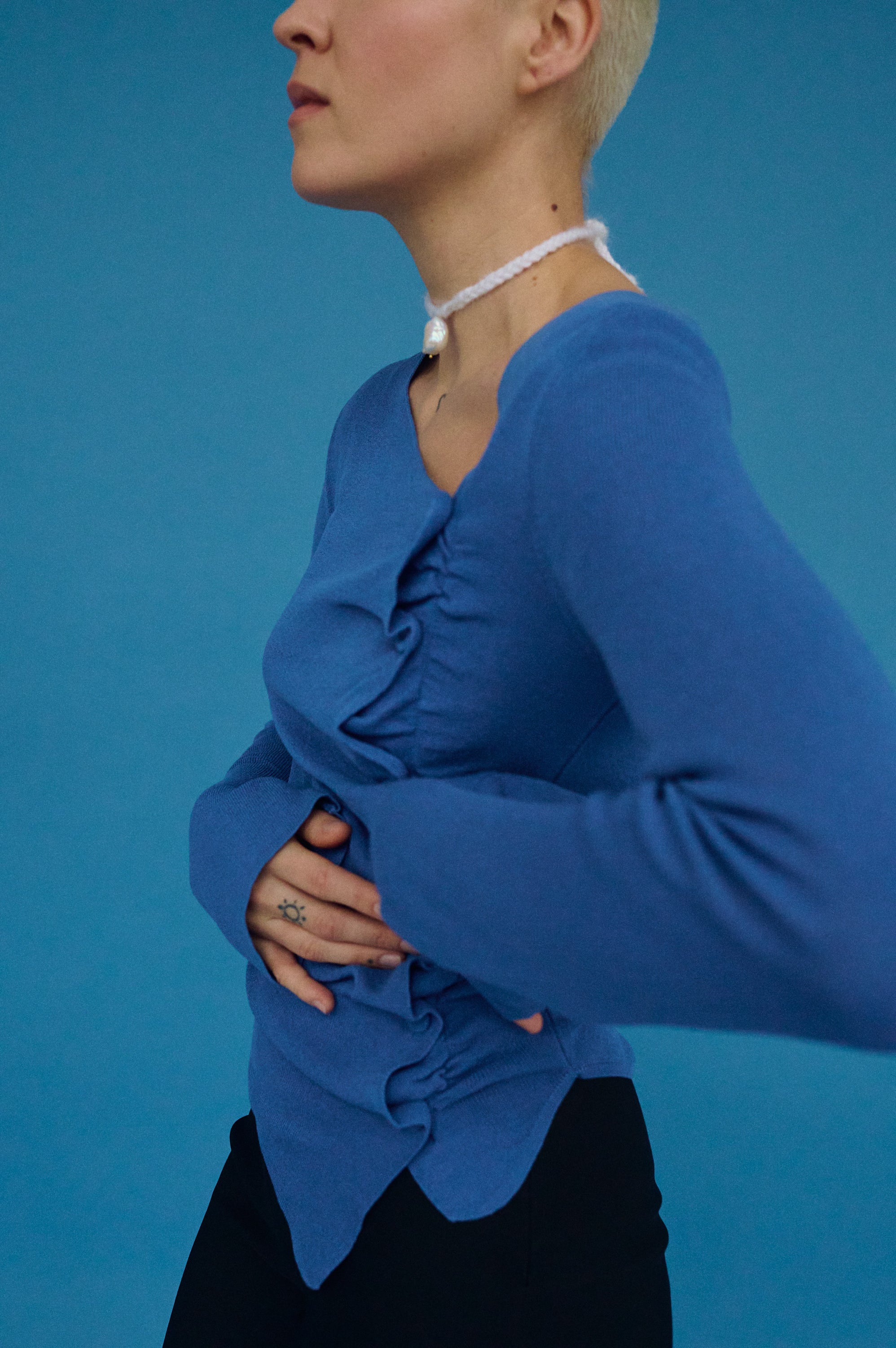 Elegant handmade necklace with mohair yarn and unique baroque pearl drop.