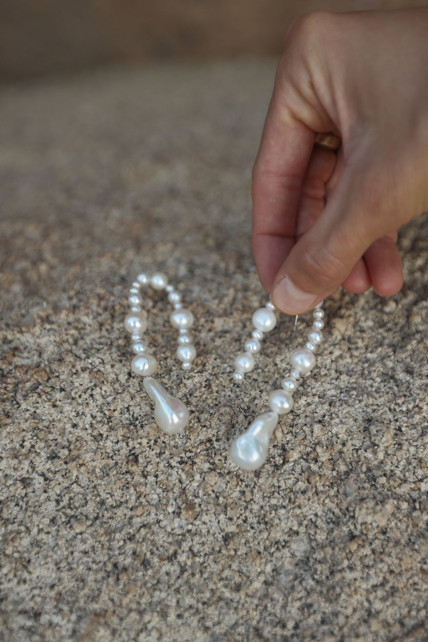 Unique baroque pearl dangle earrings making a modern statement