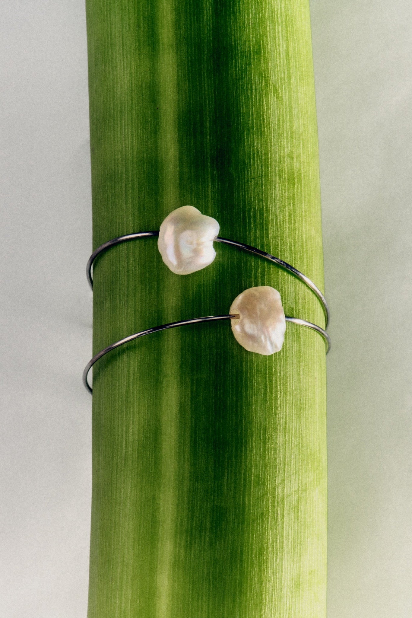 Modern silver hoop earrings with real pearls
