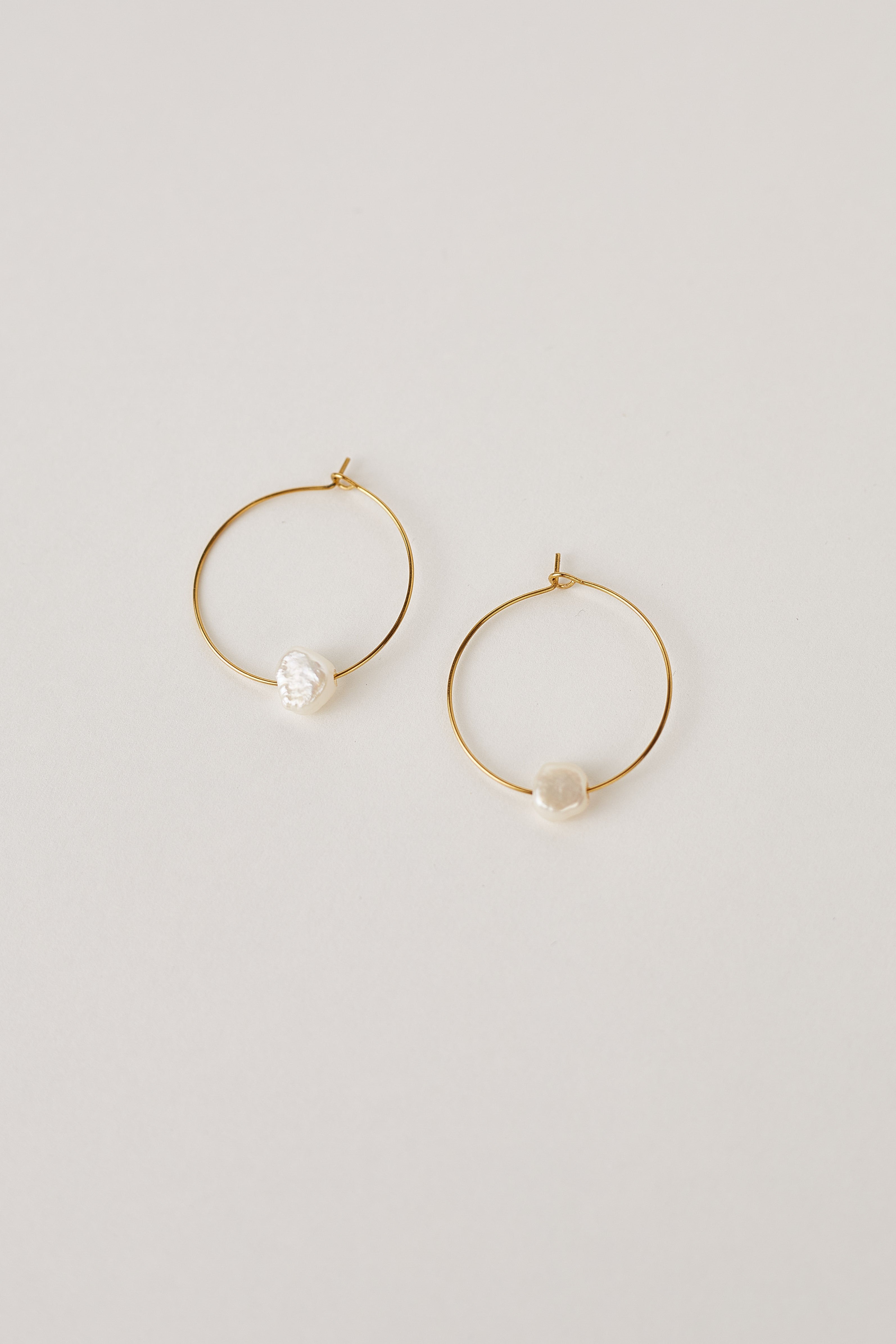 Gold hoop earrings with real pearls