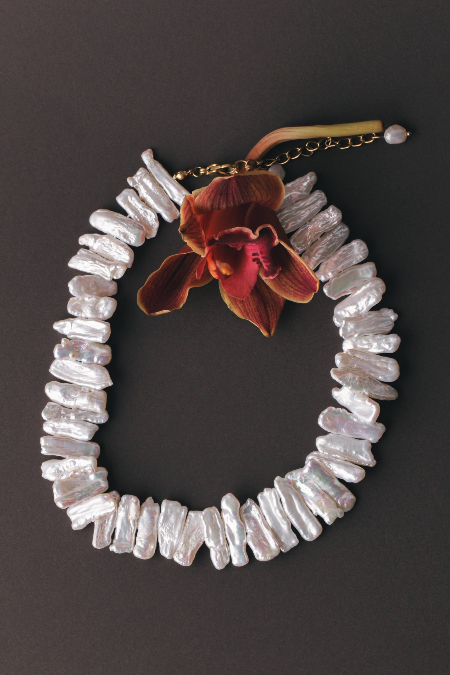 Massive white flat long Keshi pearls