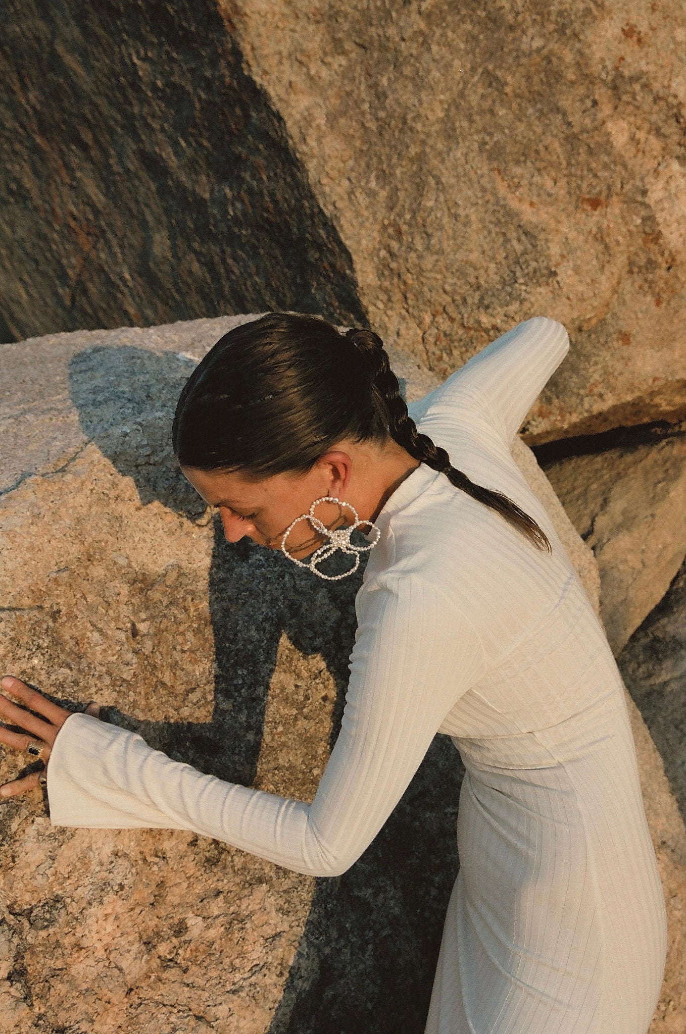 fashion editorial featuring oversized pearl earrings