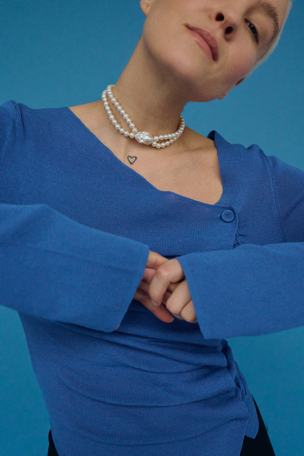 Elegant double pearl choker necklace on model