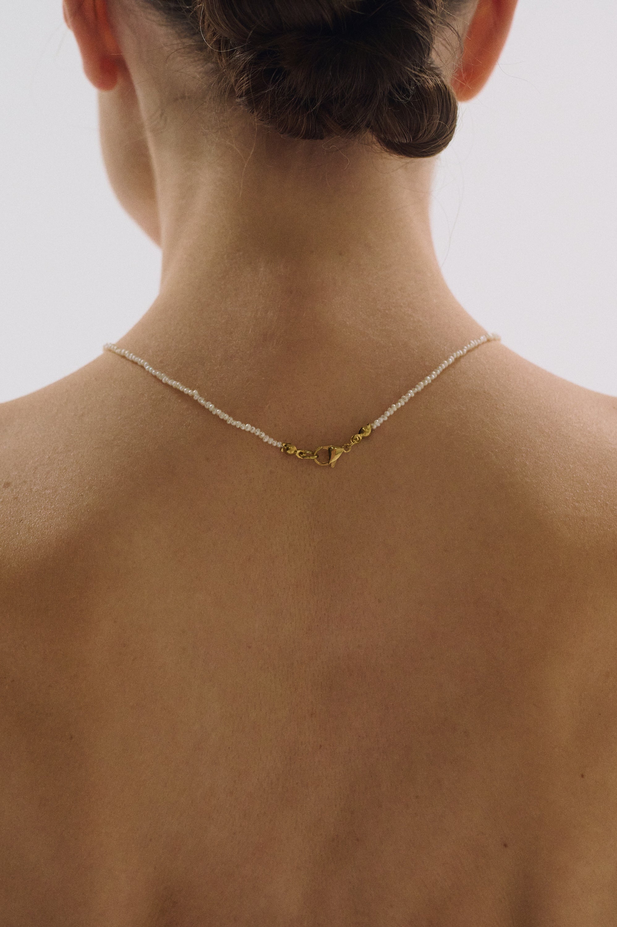Extra small freshwater pearl necklace with gold clasp – minimalist choker jewelry by UGNÈS STORY