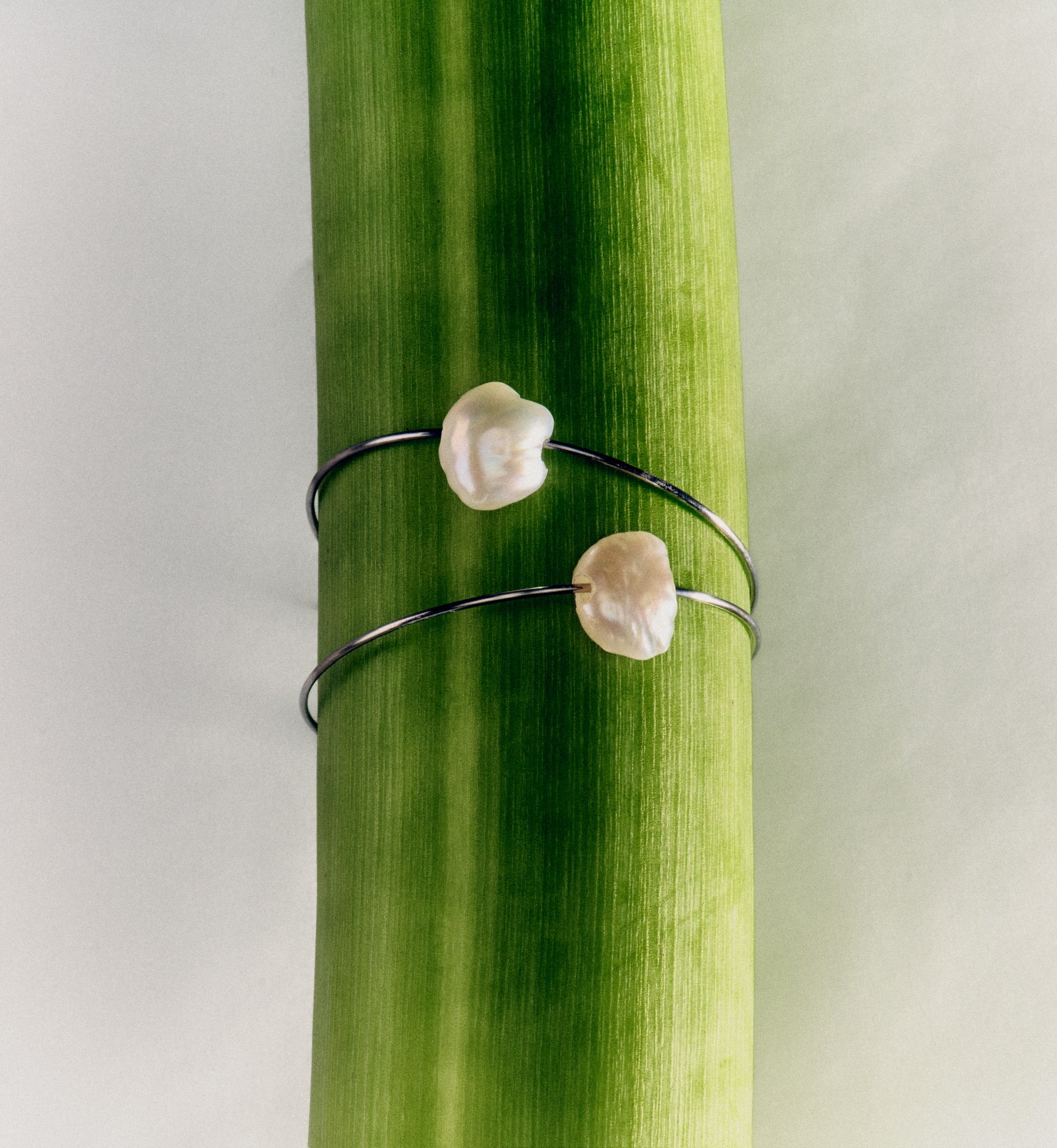 Modern silver hoop earrings with real pearls
