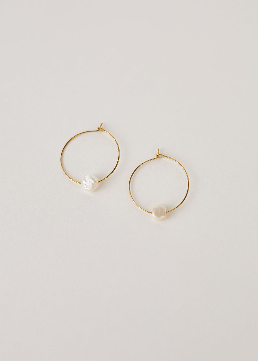 Gold hoop earrings with real pearls