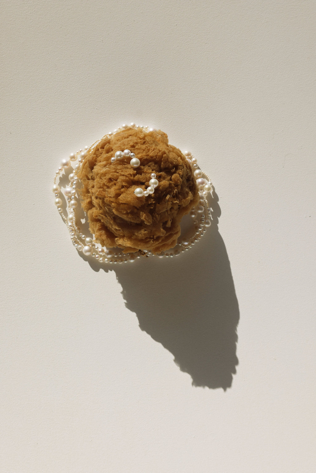 Close-up of delicate bridal pearl earrings